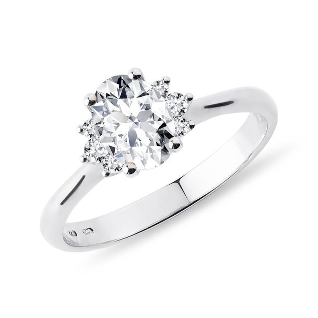 WHITE GOLD OVAL DIAMOND RING WITH SIDE DIAMONDS - DIAMOND ENGAGEMENT RINGS - ENGAGEMENT RINGS