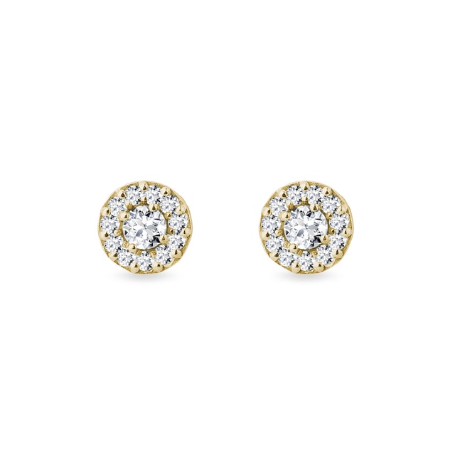 White diamond earrings in yellow gold