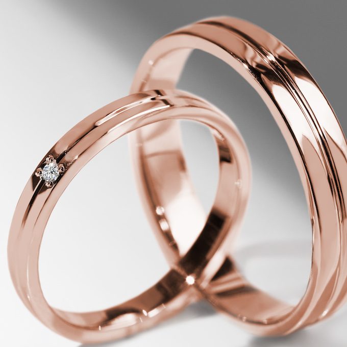 Trauringe aus 14k Roségold mit Diamanten - KLENOTA