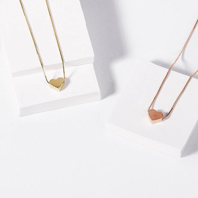 Heart pendants in yellow and rose gold - KLENOTA