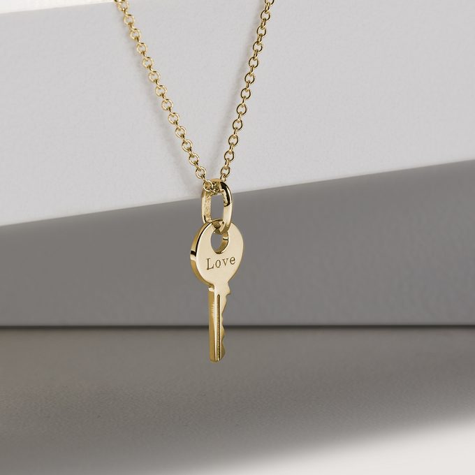 Necklace with a key in yellow 14k gold - KLENOTA