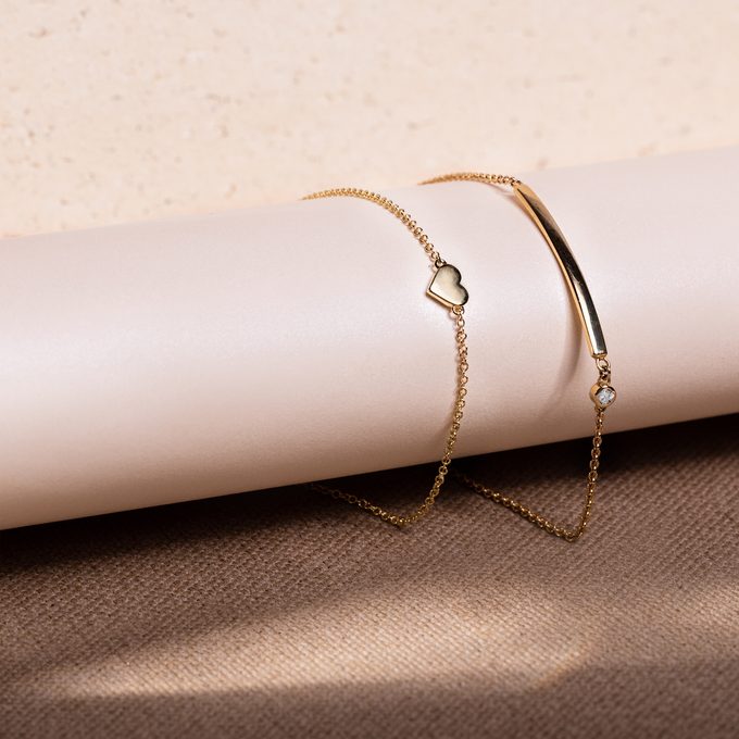 Minimalist gold bracelets with heart and stick - KLENOTA