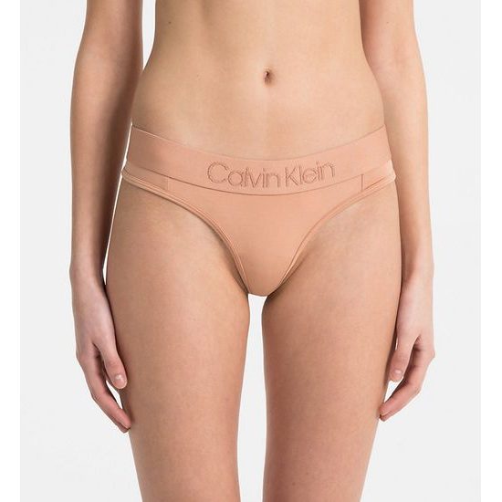 Dámské kalhotky tanga CALVIN KLEIN Tonal Logo QF4942E NUDE