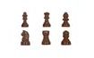 Chocolate moulds on a sheet chess