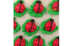 Sugar Ladybird Decorations on a Leaf