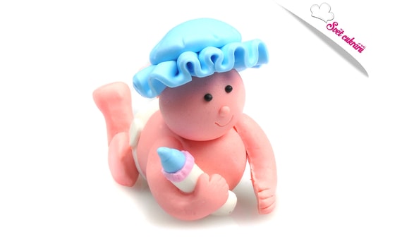 CAKE TOPPER OF A BABY WITH A BOTTLE - BOY