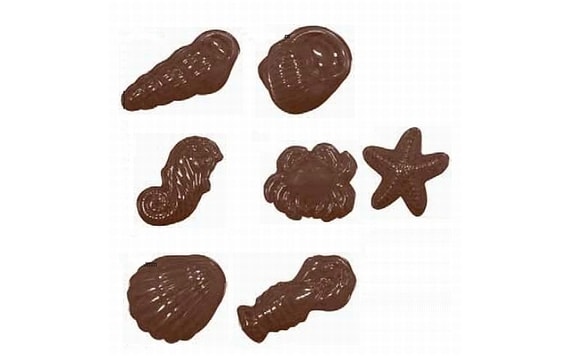 CHOCOLATE MOULDS ON A SHEET SEA FOOD