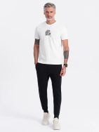 Čierne tepláky s trendy prešívaním V5 PABS-0173