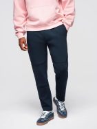 Tmavo-modré tepláky s prešívaním V2 OM-PASK-0281