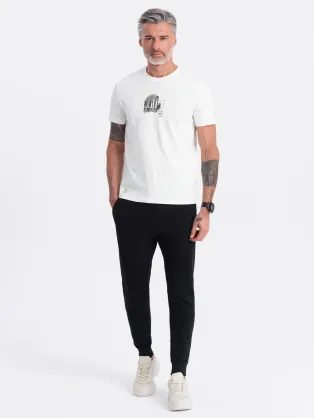 Čierne tepláky s trendy prešívaním V5 PABS-0173