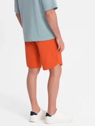 Oranžové teplákové kraťasy V5 SRSK-0105