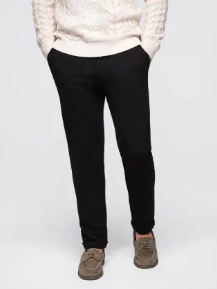 Elegantné pánske teplákové nohavice čierne V2 OM-PACP-0283