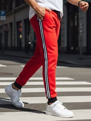 Pánske červené tepláky s ozdobným pásom