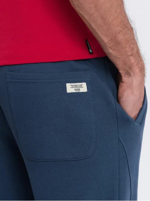 Tmavo modré tepláky s trendy prešívaním V4 PABS-0173