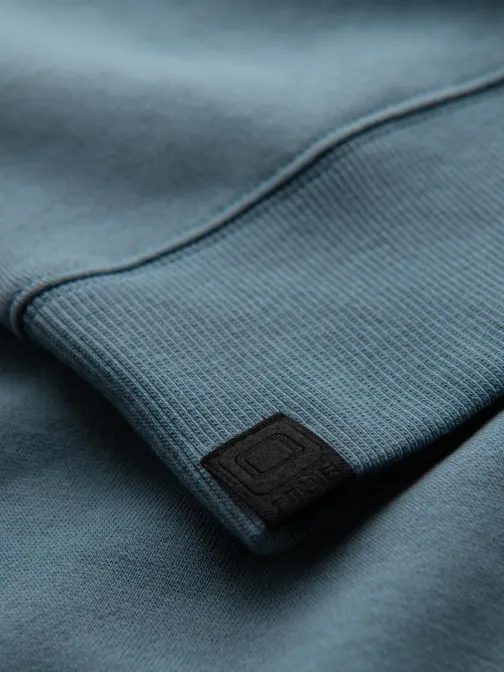 Trendy tyrkysovo-modrá mikina bez kapucne s ozdobným rukávom V4 OM-SSNZ-0200