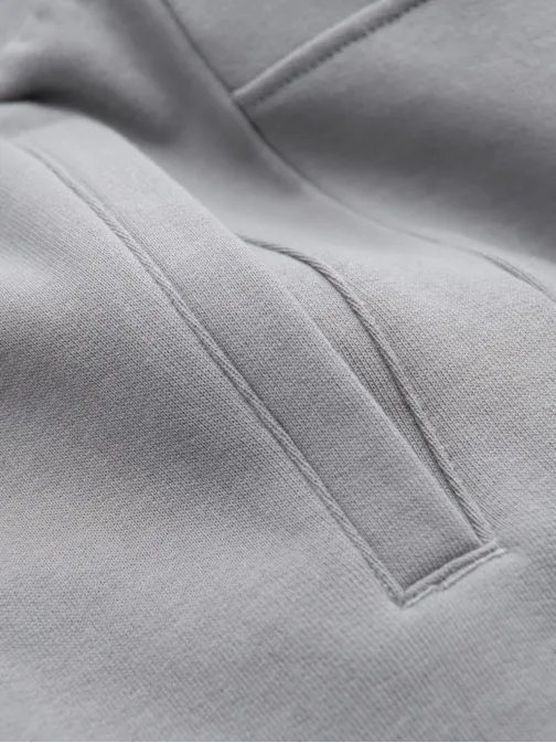 Šedé tepláky s trendy prešívaním V8 PABS-0173