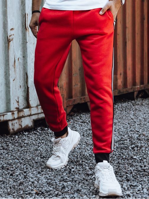 Pánske červené tepláky s ozdobným pásom