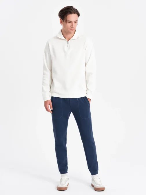 Trendy tmavomodré úpletové tepláky V5 PASK-0143