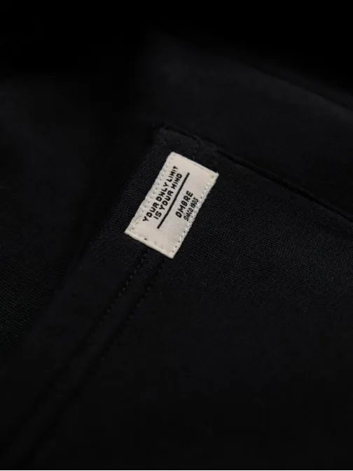 Zaujímavé čierne tepláky V5 PABS-0206