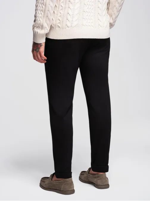 Elegantné pánske teplákové nohavice čierne V2 OM-PACP-0283