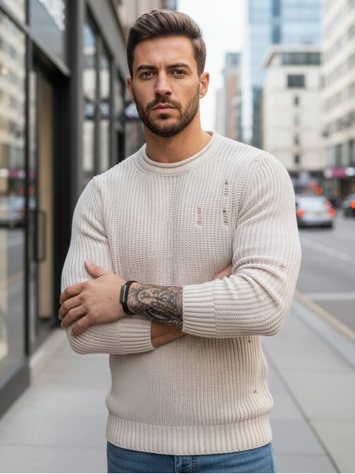 Béžový pletený sveter s módnymi dierami