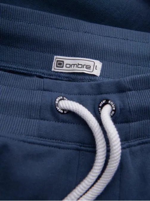 Tmavo modré tepláky s trendy prešívaním V4 PABS-0173