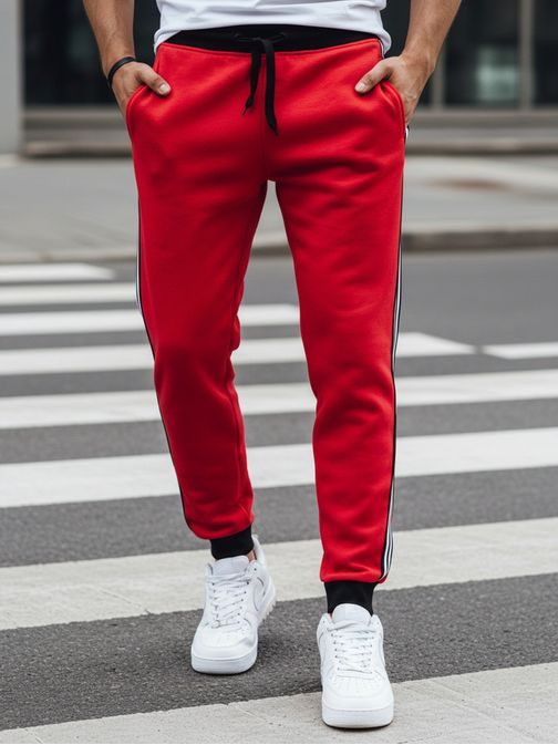 Pánske červené tepláky s ozdobným pásom