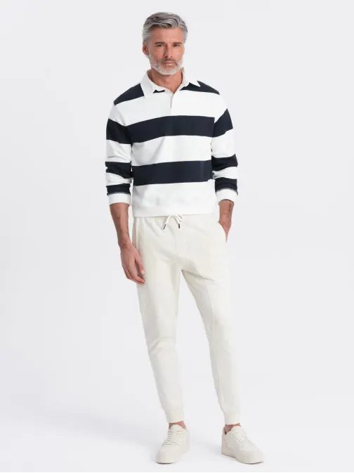 Krémové tepláky s trendy prešívaním  V11 PABS-0173