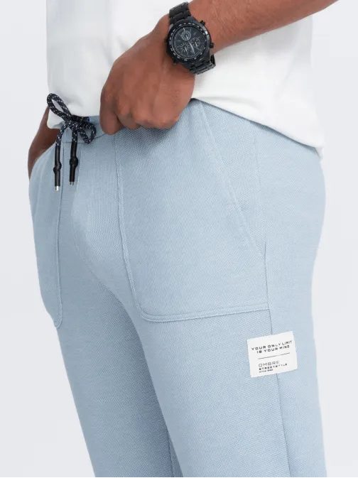 Trendy svetlo modré pletené tepláky V4 PASK-0211