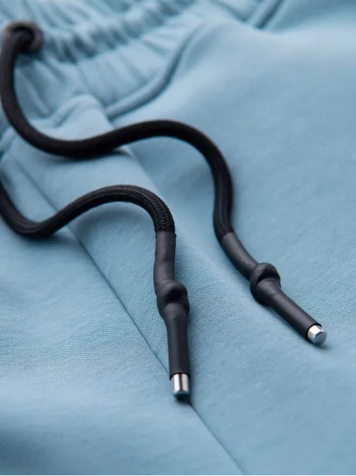 Nadčasové svetlomodré tepláky V4 PASK-0226