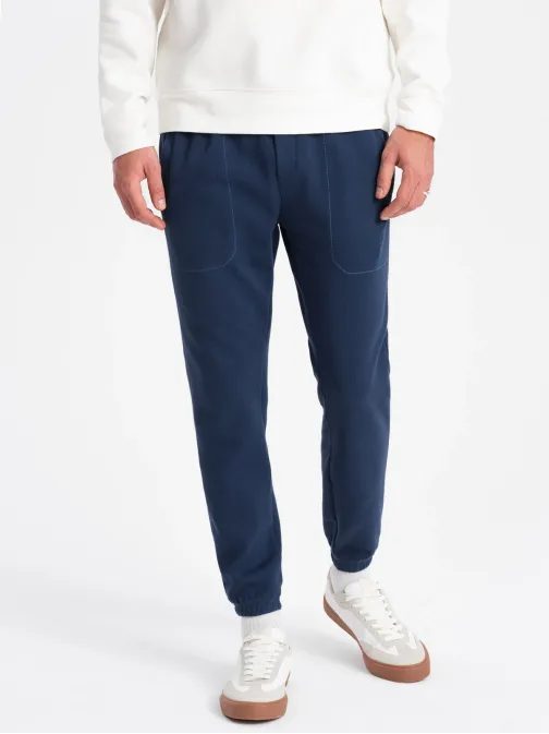 Trendy tmavomodré úpletové tepláky V5 PASK-0143