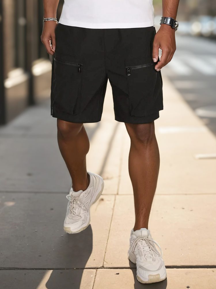 Levně Dstreet Trendy černé kapsáčové kraťasy