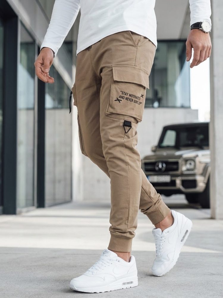 Levně Dstreet Originální béžové pánské kapsáčové jogger kalhoty