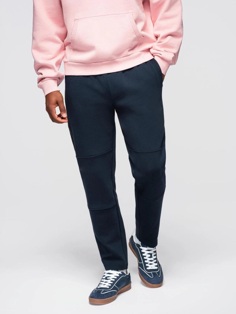 Levně Ombre Clothing Tmavě modré tepláky s prošíváním V2 OM-PASK-0281
