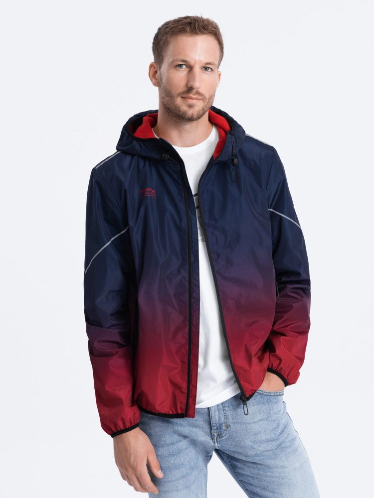 Levně Ombre Clothing Sportovní přechodná bunda s reflexními prvky modrá v3 om-janp-0105