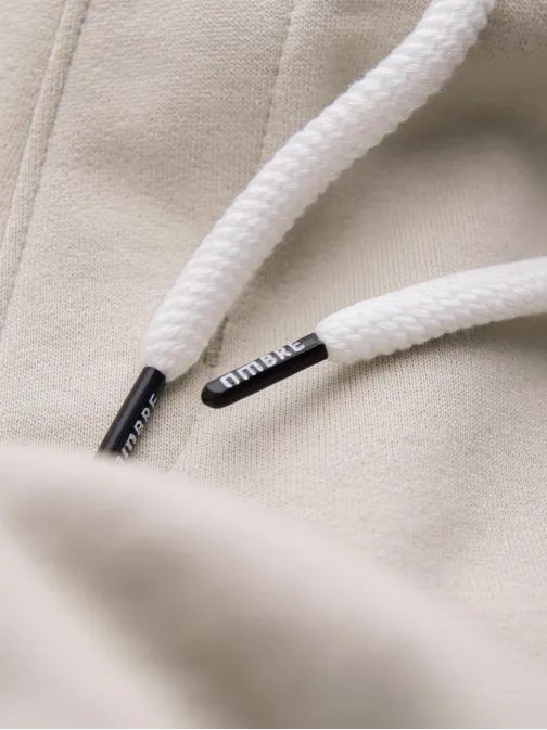 Béžové tepláky s trendy prošíváním V1 PABS-0173