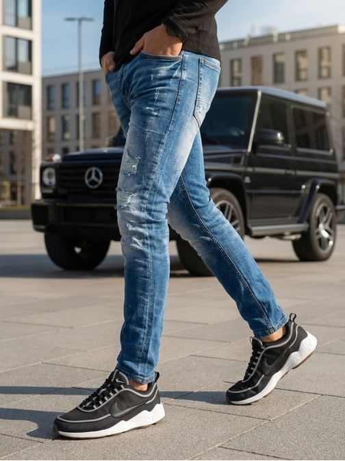 Moderní roztrhané džíny modré