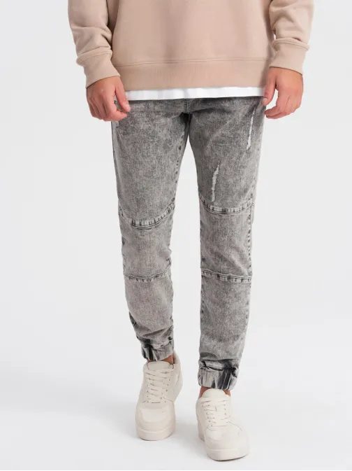 Trendy šedé džínové joggery s ozdobnými oděrkami V3 PADJ-0153