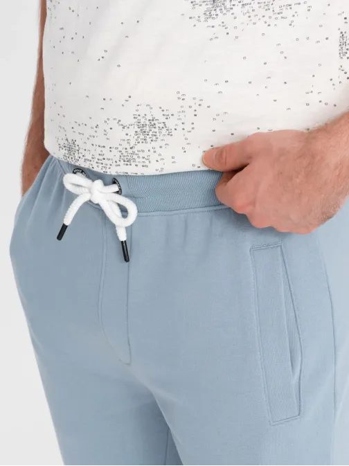 Zajímavé světle modré tepláky V7 PABS-0206