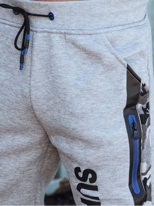 Zajímavé pánské tepláky s nápisem v šedé barvě