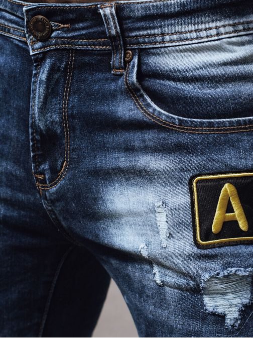 Módní roztrhané džíny pro muže