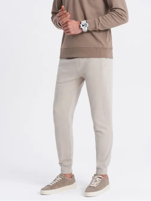 Béžové tepláky s trendy prošíváním V1 PABS-0173