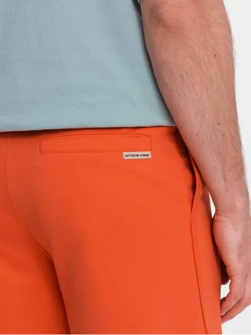 Oranžové teplákové kraťasy V5 SRSK-0105