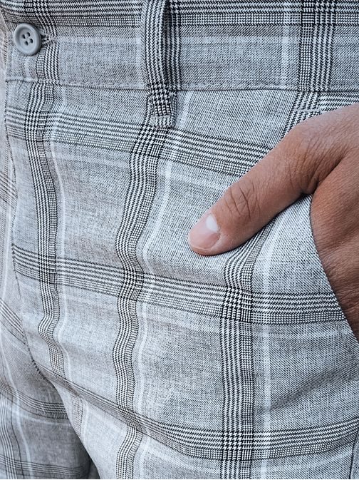 Poutavé světle šedé kalhoty s károvaným vzorem