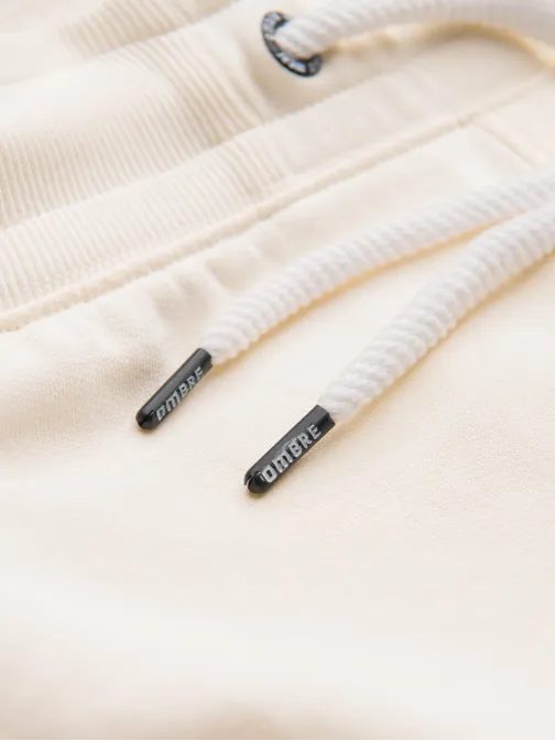 Zajímavé krémové tepláky V11 PABS-0206