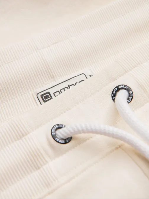 Zajímavé krémové tepláky V11 PABS-0206