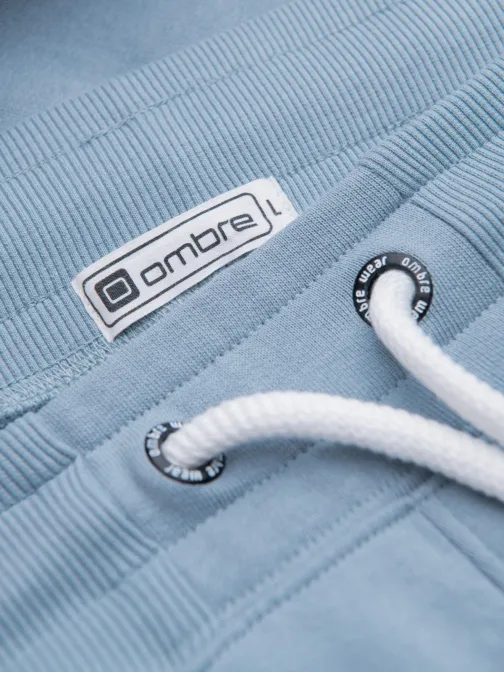 Světle modré tepláky s trendy prošíváním V7 PABS-0173