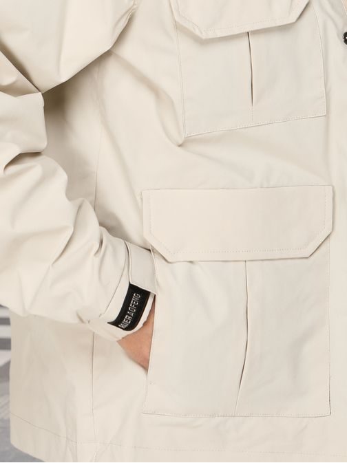 Přechodová béžová bunda ve stylovém designu