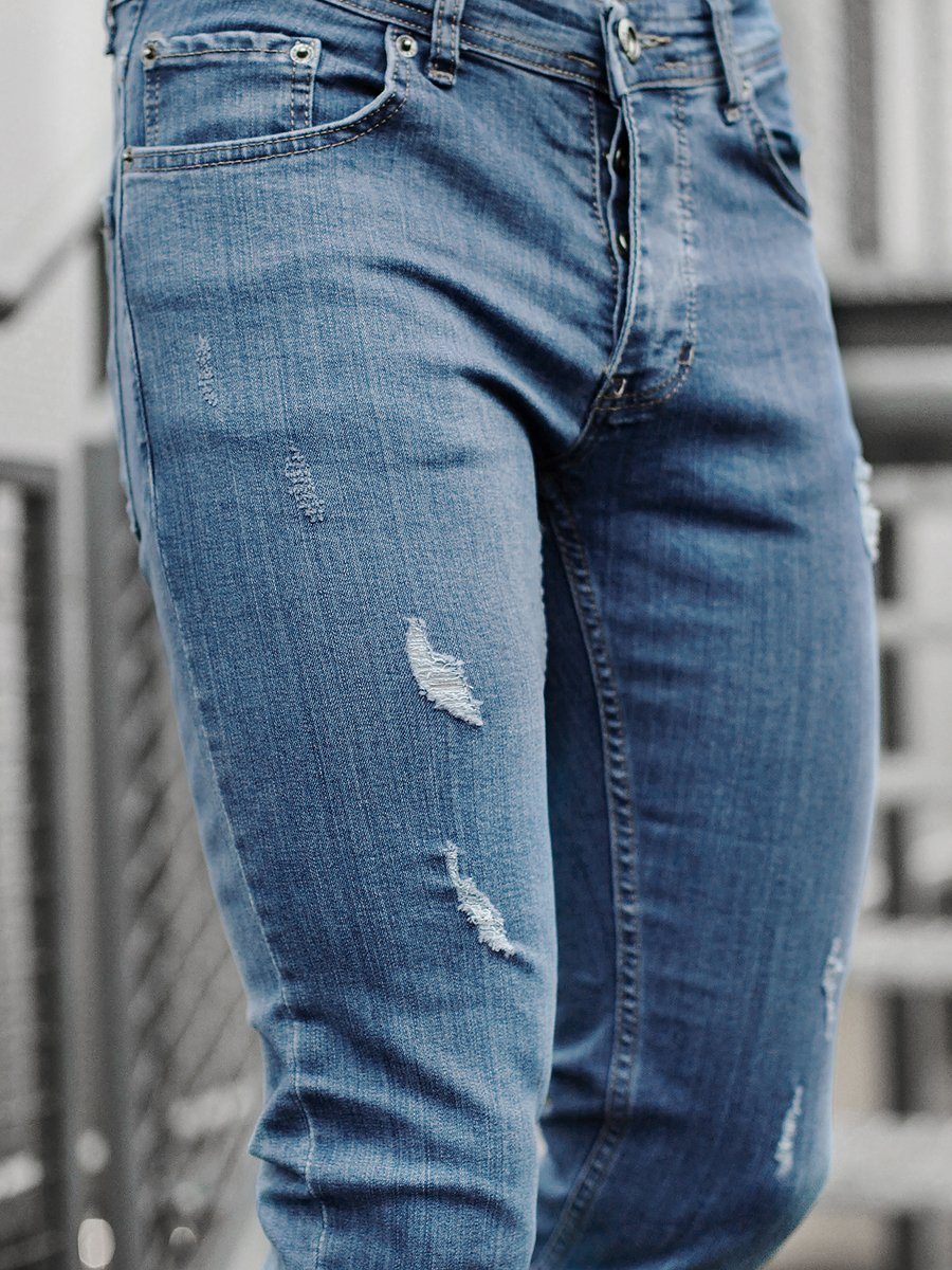 roztrhané modré džíny
