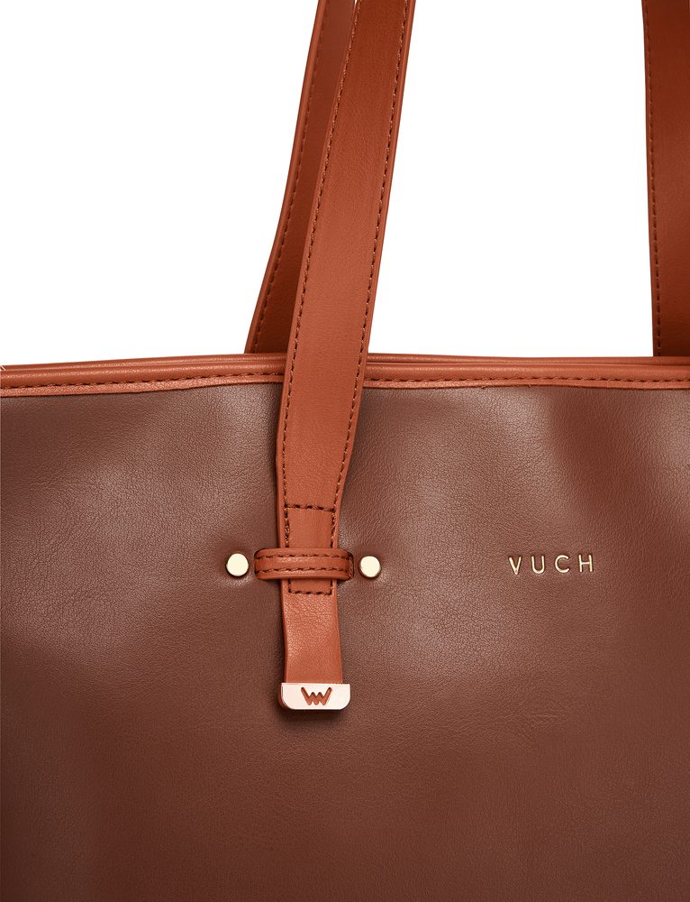 VUCH Benita MN Brown.

Hlavné zapínanie na zips
Vnútorné priehradky na drobnosti
Vo vnútri malá kozmetická taštička
Súčasťou kabelky je crossbody popruh
 Monogram
Chceš mať nebývalý šmrnc a byť Vuch každým centimetrom?
Vuch je Tvoja najvernejšia láska, tak to povedz všetkým bez jediného slova.
